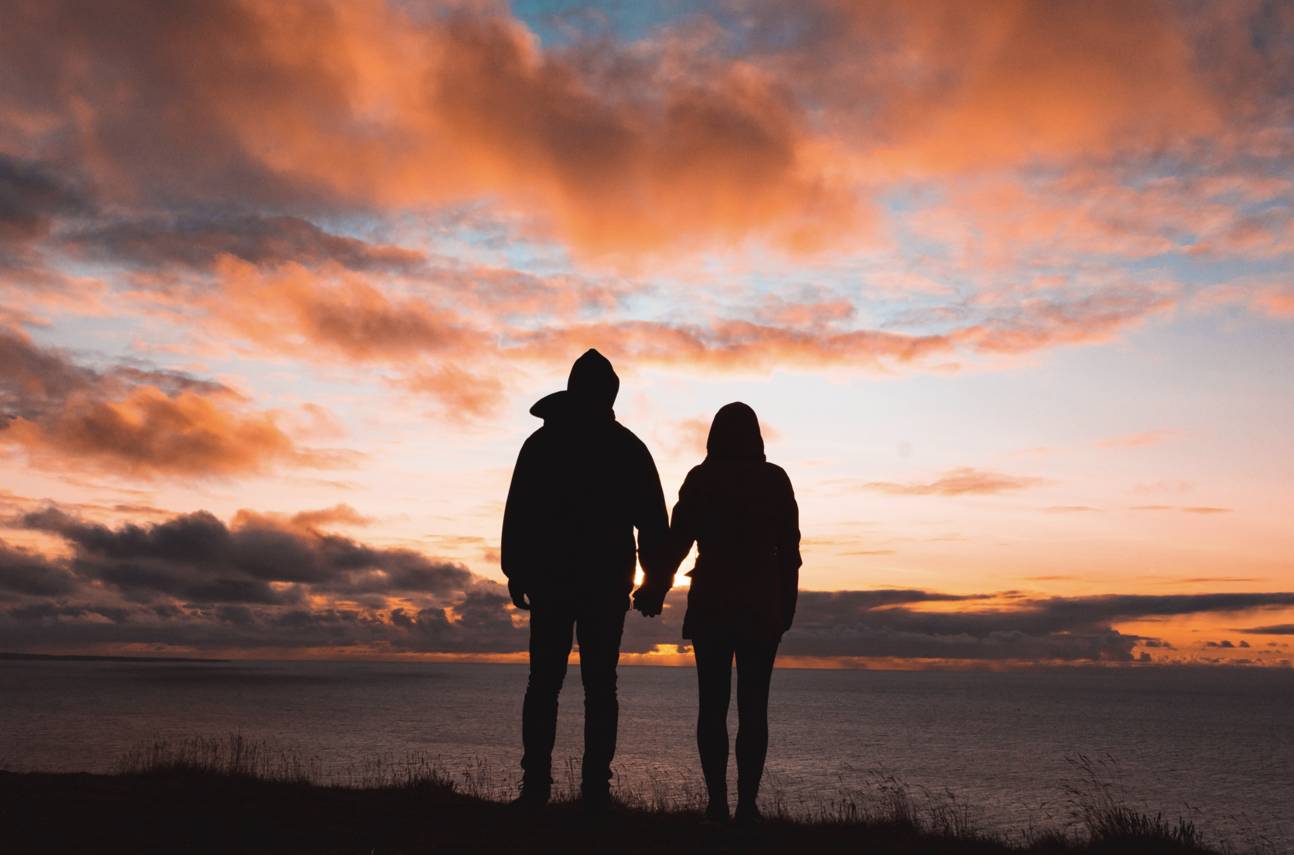 Couple holding hands